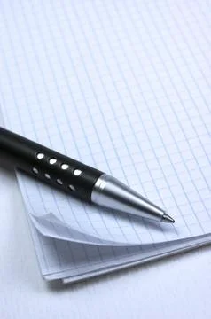 Notepad and pen Stock Photos