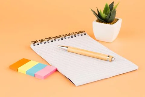 Notepad and pen Stock Photos