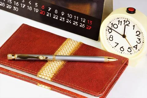 A notepad and a pen for writing. Stock Photos