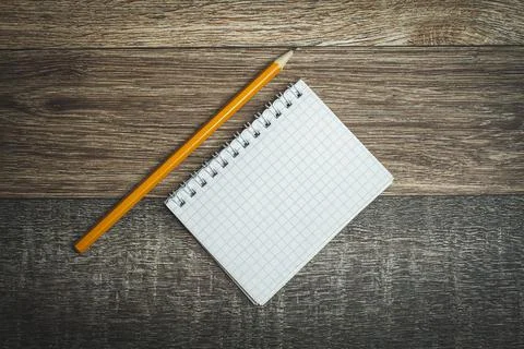 Notepad and pencil. Notes in a notebook. Template for records. Reminder note Stock Photos