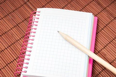 Notepad and pencil Stock Photos