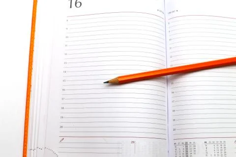 Notepad and pencil Stock Photos