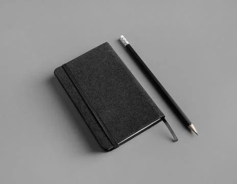 Notepad and pencil Stock Photos