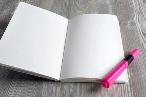 Notepad with black marker Stock Photos