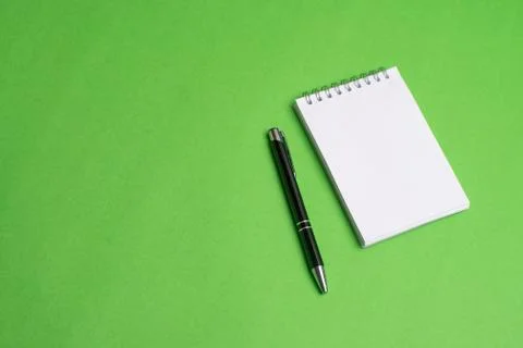 Notepad with black pen in the office Stock Photos