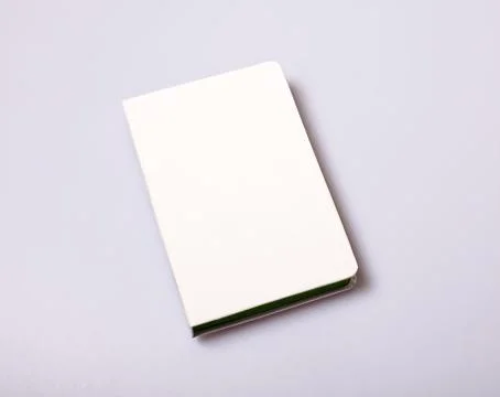Notepad blank cover on white table Stock-Fotos