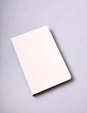 Notepad blank cover on white table Stock Photos