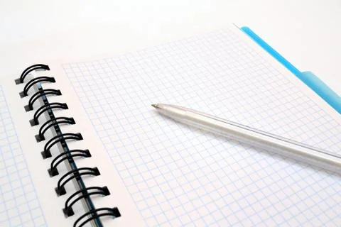 Notepad with blue pen isolated on white Stock Photos