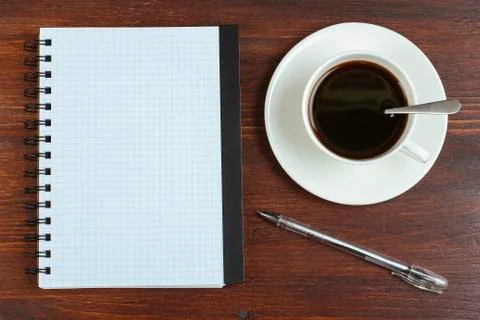 Notepad with coffee Stock Photos