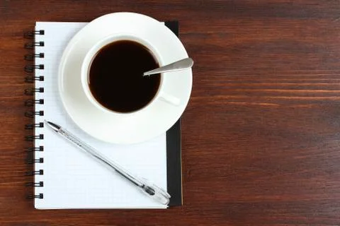 Notepad with coffee Stock Photos