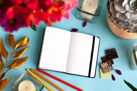 Notepad on color background Stock Photos