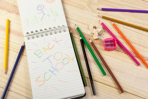 Notepad with a colourful back to school message on it Stock Photos
