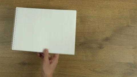 Notepad on the desk, blank paper, add drawing Stock Footage 70685289