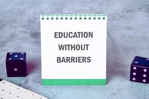 A notepad displays the phrase education without barriers surrounded by colorf Stock Photos