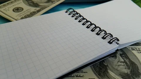 Notepad dollars hands Stock Footage 88140789
