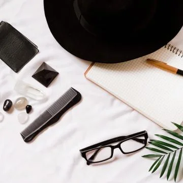 Notepad for entries while traveling. comb, hat, pen, business card Fotos Stock