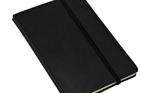 Notepad for everyday notes and notes on a white background Stock Photos