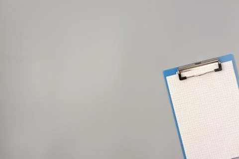 Notepad flat lay on gray background Stock Photos
