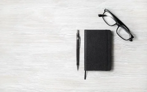 Notepad, glasses, pencil Stock Photos