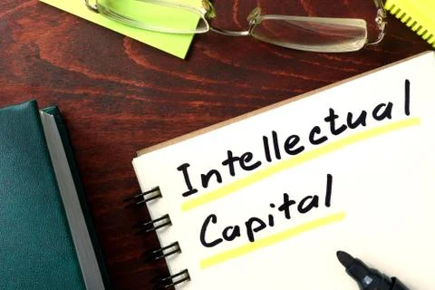 Notepad with Intellectual capital on the table. Stock Photos