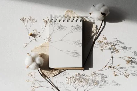 Notepad mockup for showcasing artwork and design. A notebook with an open blank Stock Photos