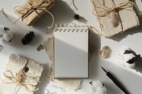 Notepad mockup for showcasing artwork and design. A notebook with an open blank Stock Photos