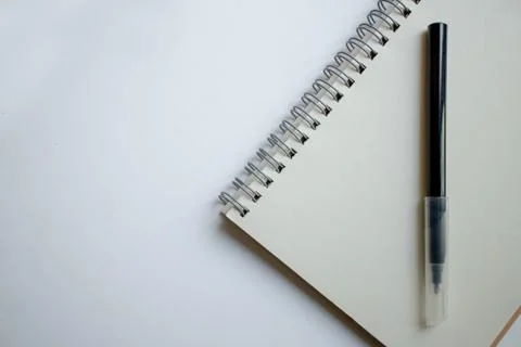 Notepad for notes on the rings and a black felt-tip pen. Quick notes at hand Stock Photos