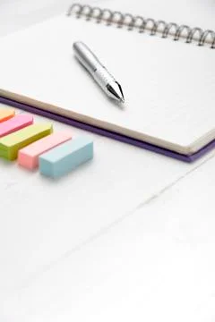 Notepad with office supplies Stock Photos
