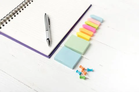 Notepad with office supplies Stock Photos