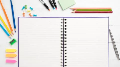 Notepad with office supplies Stock Photos