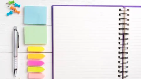 Notepad with office supplies Stock Photos