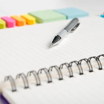 Notepad with office supplies Stock Photos