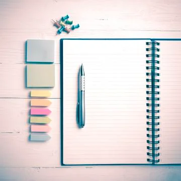 Notepad with office supplies Stock Photos