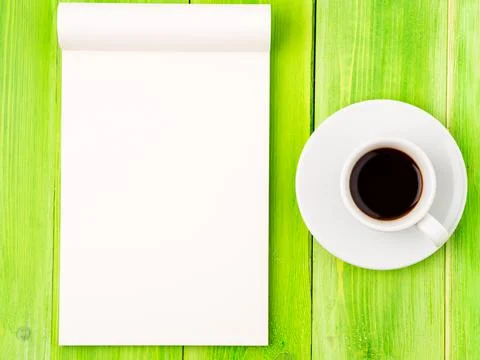 Notepad open with white blank page for writing idea or to-do list, a Cup of Stock Photos