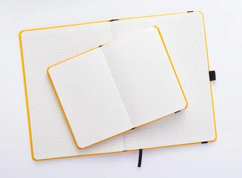 Notepad or notebook paper at white background Stock Photos