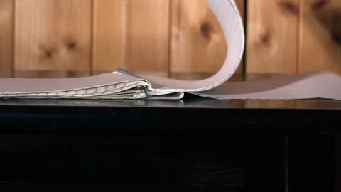 Notepad paper blowing in the wind Stock Footage 247436513