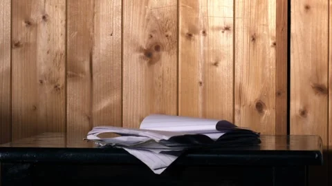 Notepad paper blowing in the wind Video stock 247917490