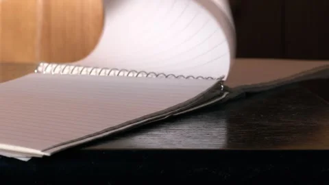 Notepad paper blowing in the wind Video stock 248076245