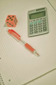 Notepad, Pen, Calculator and Dice (Pastel Colors) Stock Photos