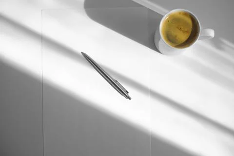 Notepad, pen, coffe  on white table Stock Photos