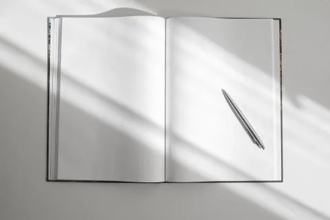 Notepad, pen, coffe  on white table Stock Photos