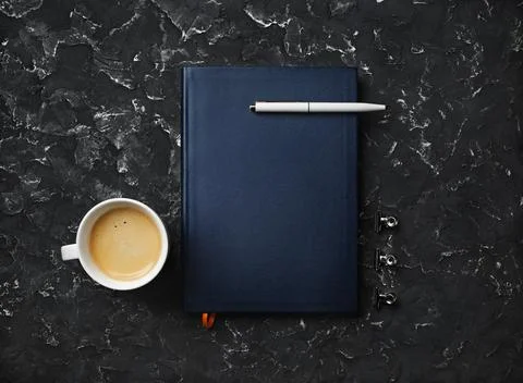 Notepad, pen, coffee cup Stock Photos