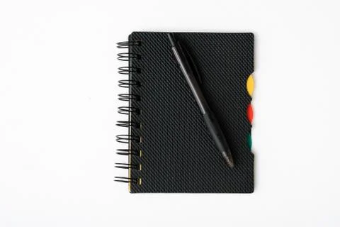 Notepad with pen isolated Stock Photos