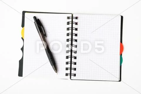 Notepad with pen isolated Stock Photos