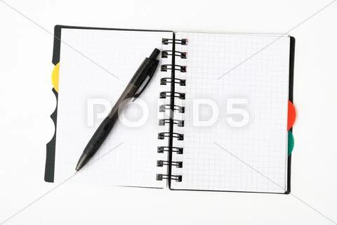 Notepad with pen isolated Stock Photos