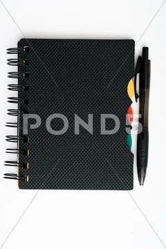 Notepad with pen isolated Stock Photos