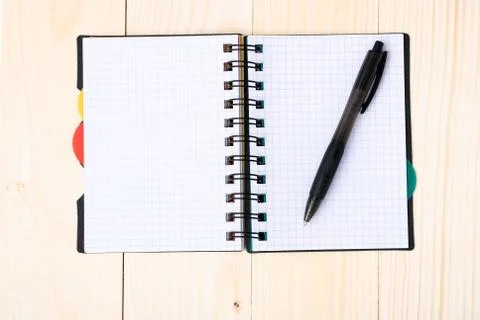 Notepad with pen isolated Foto stock