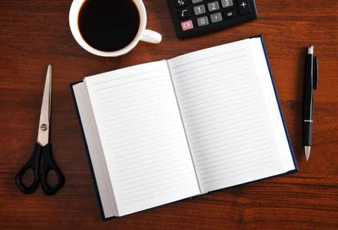 Notepad with pen Stock Photos