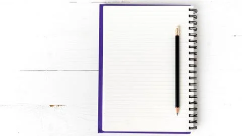Notepad with pen Stock Photos
