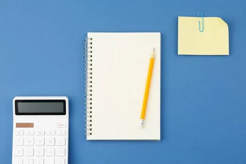 Notepad, pencil, calculator, note sheet. Stock Photos